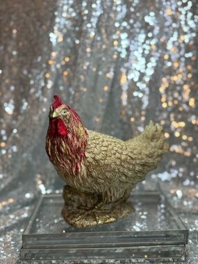Gold and red rooster figurine
